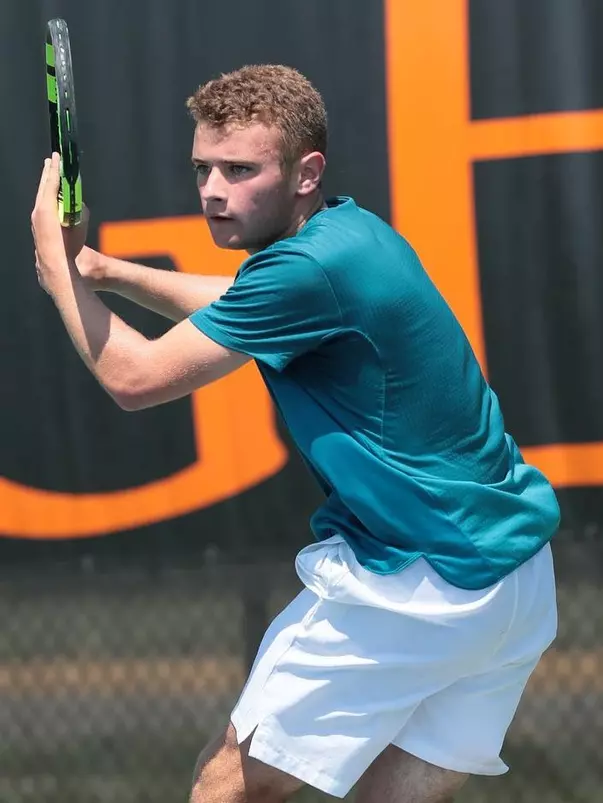 Ben Letzer gets in position to swing his forehand.