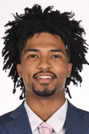 Miles Brewster headshot