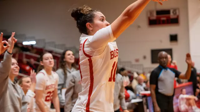 Photo of BU women's basketball sophomore Rose Azmoudeh shooting a three-pointer.