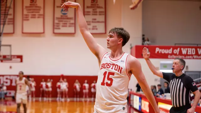 Andrew Bhesania attempts a corner 3-point shot at Case Gym