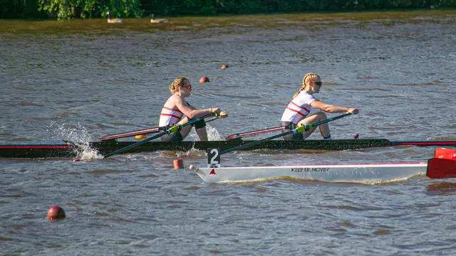 Photo of the BU Lightweight Rowing Double racing at the IRA Championship.