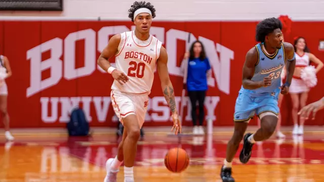Michael McNair dribbles the ball up the court