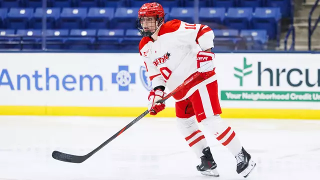 Tessa Demain playing hockey at UNH