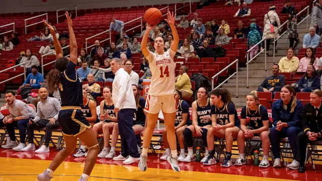 Photo of BU women's basketball junior Inés Monteagudo shooting a three-pointer against Navy at Case Gym.