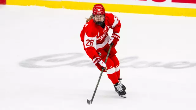 Ella Pukala playing hockey at Wisconsin