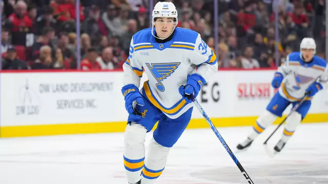 Dylan Peterson playing hockey for the St. Louis Blues