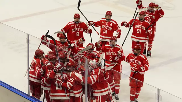 BU men's ice hockey team celebrates after Tynan Lawrence's overtime goal