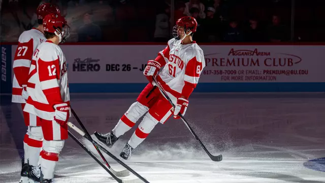 Haoxi Wang stops at the blue line during pregame introductions