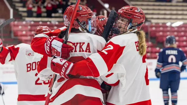 BU celebrates goal against RMU in ice breaker