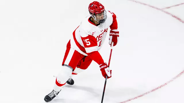 Carter Amico playing hockey for BU