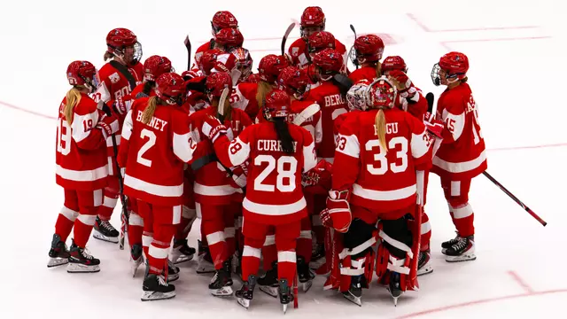 Women's ice hockey huddle post shootout win