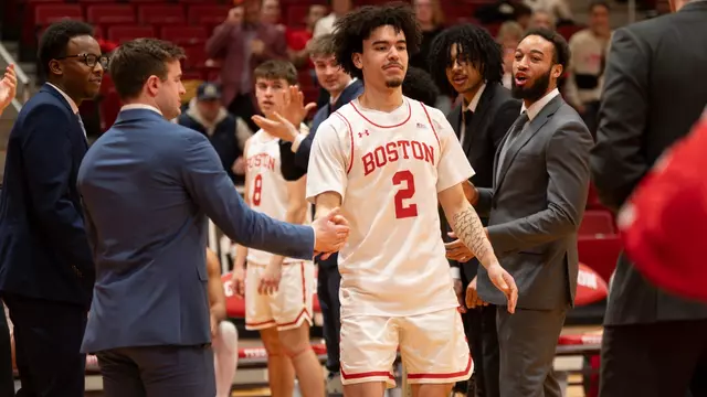 Chance Gladden hits hands with teammates during lineup announcement