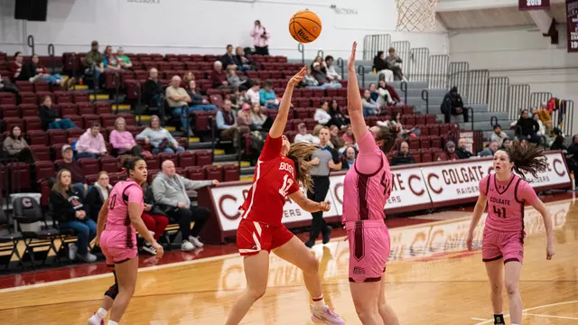 Photo of BU women's basketball junior Bella McLaughlin shooting a layup at Colgate.
