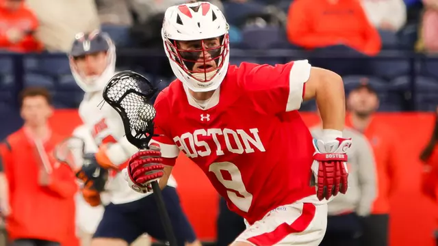 Luke Davis playing lacrosse