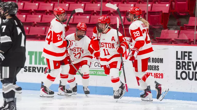 Women's ice hockey celebrates goal at walter brown arena