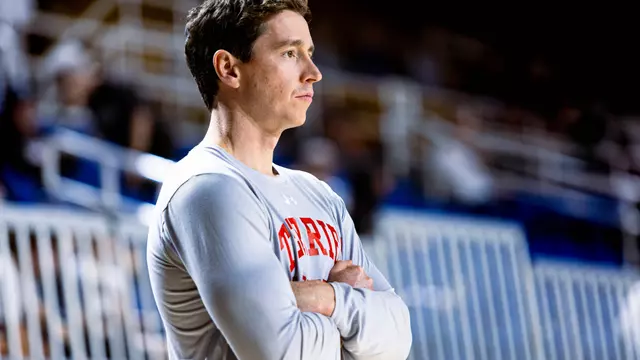 Associate head coach Mike Quinn at warmups for the Patriot League championship.