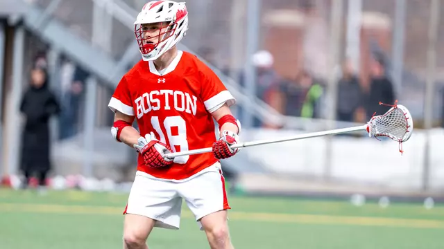 Logan Styles playing lacrosse