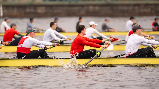 Photo of multiple BU Men's Rowing crews racing on the Charles River.