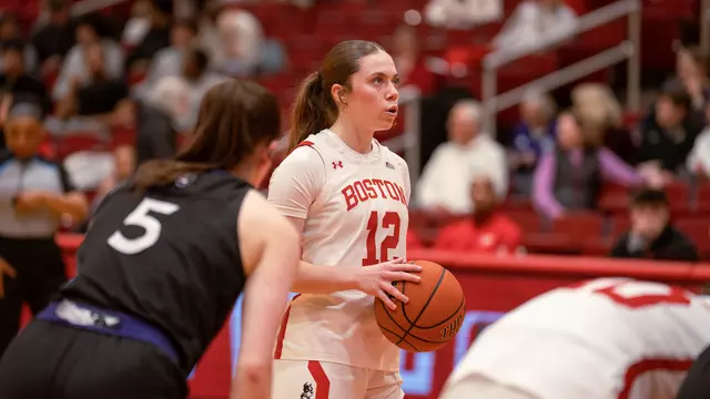 Photo of women's basketball junior Bella McLaughlin about to shoot a free throw at Case Gym.