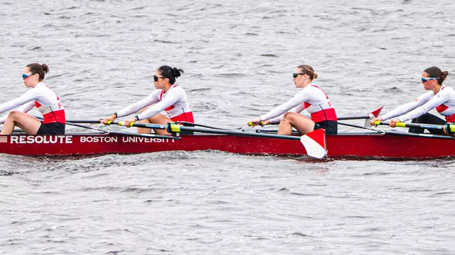 Photo of the BU Lightweight Rowing Fours racing on the Charles River.