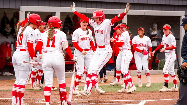 Kylie Doherty reaches home plate to celebrate with teammates after hitting her first of two home runs in the championship round of the 2026 Patriot League tournament
