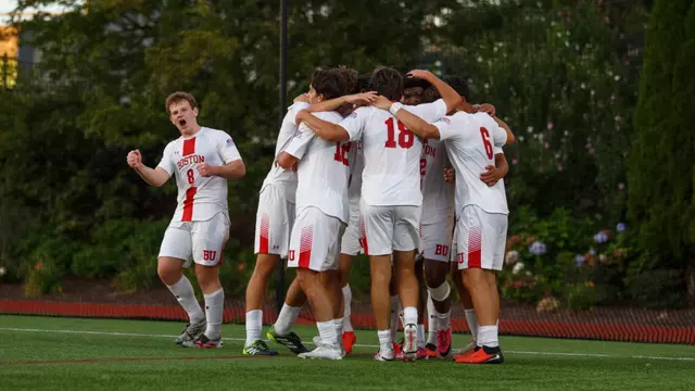Men's soccer celebrating Andrea's goal against Army
