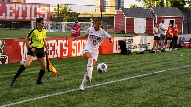 Photo of BU women's soccer sophomore Nina Tzouganatos settling a ball at Nickerson Field.