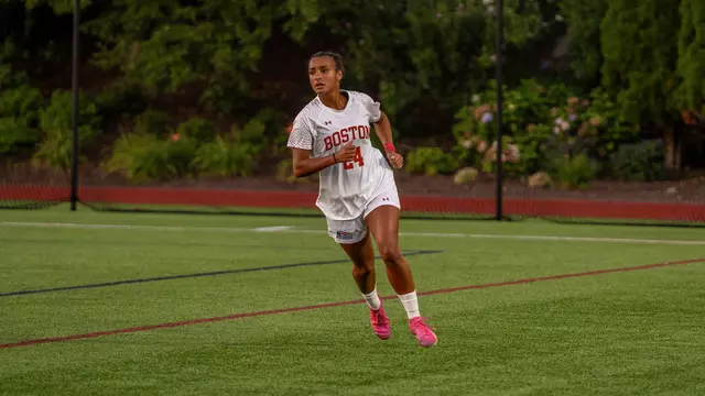 Photo of BU women's soccer sophomore Ariana Schwinn-Clanton running on Nickerson Field.