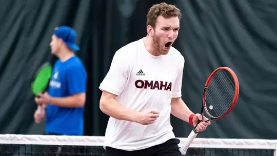 Nate Reekie celebrates after winning a point for Omaha