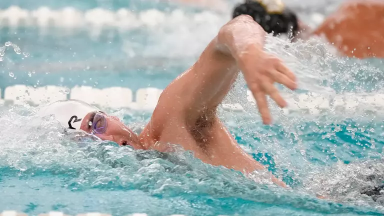 Swimming & Diving Cruises to Victories over UMBC