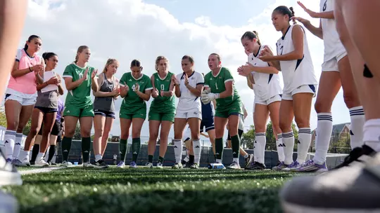 Women's Soccer Team Huddle vs. Howard