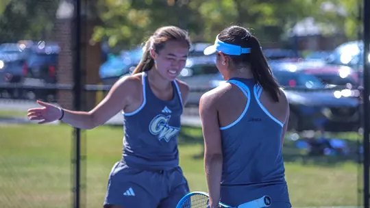 Madison Lee and Victoria Sasinka Celebrate after a Doubles Win