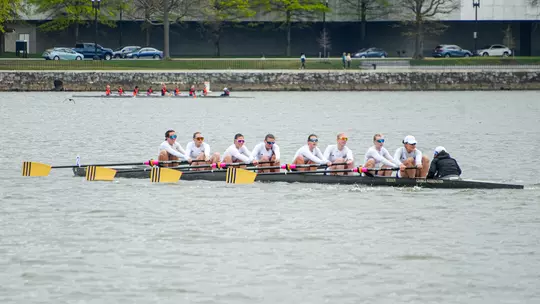 Varsity 8 competes on the Potomac during the GW Invite