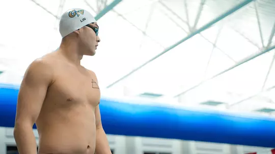 Preston Lin standing poolside at A-10s