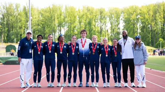Outdoor T&F Medalists and Coaches