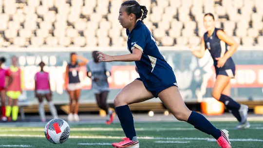 Kalia Kau Dribbles Up the Field at Howard