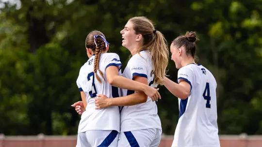 Isabelle Ohlmann Celebrates a Goal vs. Colgate with her Teammates