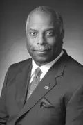 Dennis E. Thomas