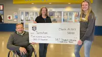 SALT presents a check to Turnstone