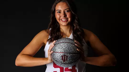 Competitiveness Fuels Holmes’ All-America Rise