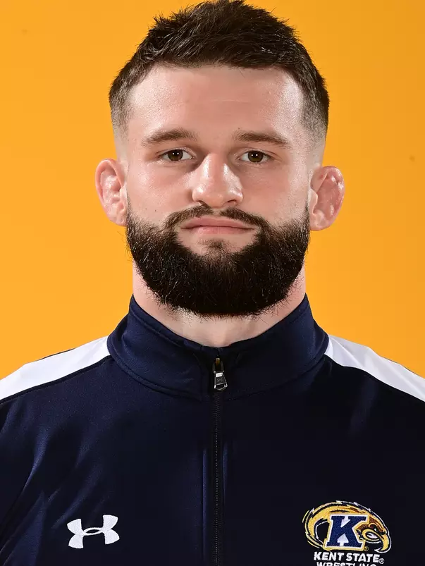 Komara_Headshot_2021