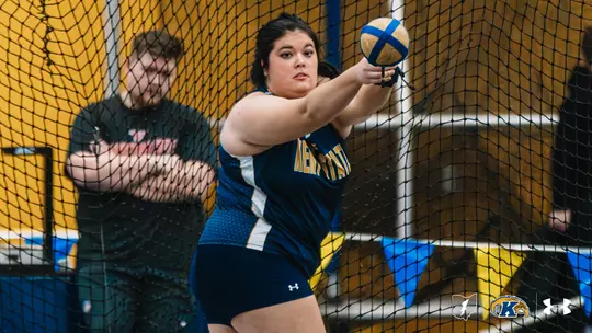 Madelyn Jenkins in weight throw action at Jud Logan Memorial