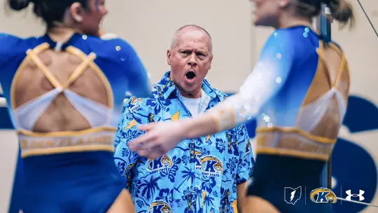 Brice Biggin celebrating at a home meet