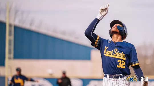 Micah Rienstra-Kitacofe pointing to the sky