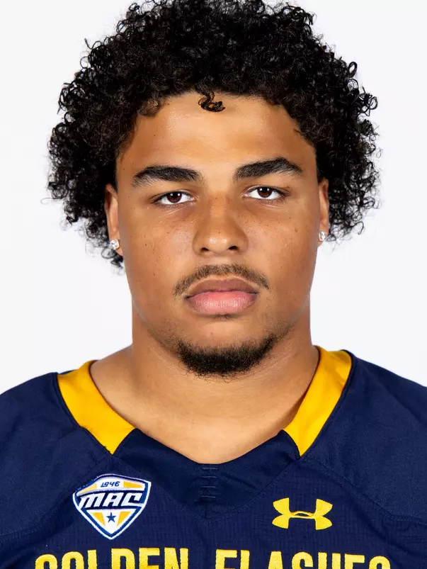 Headshot of a Kent State football player wearing a navy blue jersey with 'Golden Flashes' text in gold letters