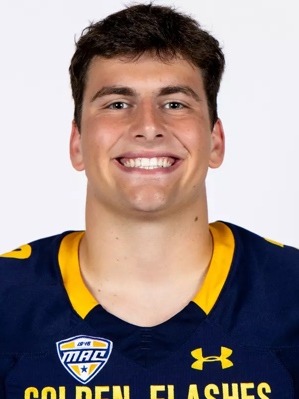 Headshot of a Kent State football player wearing a navy blue jersey with 'Golden Flashes' text in gold letters
