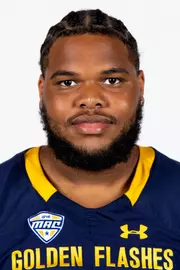 Headshot of a Kent State football player wearing a navy blue jersey with 'Golden Flashes' text in gold letters