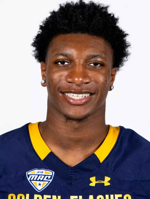 Headshot of a Kent State football player wearing a navy blue jersey with 'Golden Flashes' text in gold letters