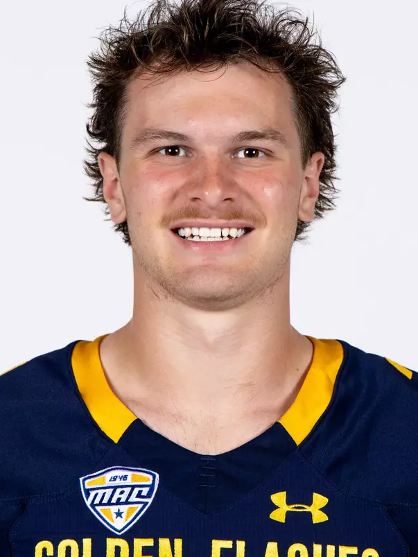 Headshot of a Kent State football player wearing a navy blue jersey with 'Golden Flashes' text in gold letters