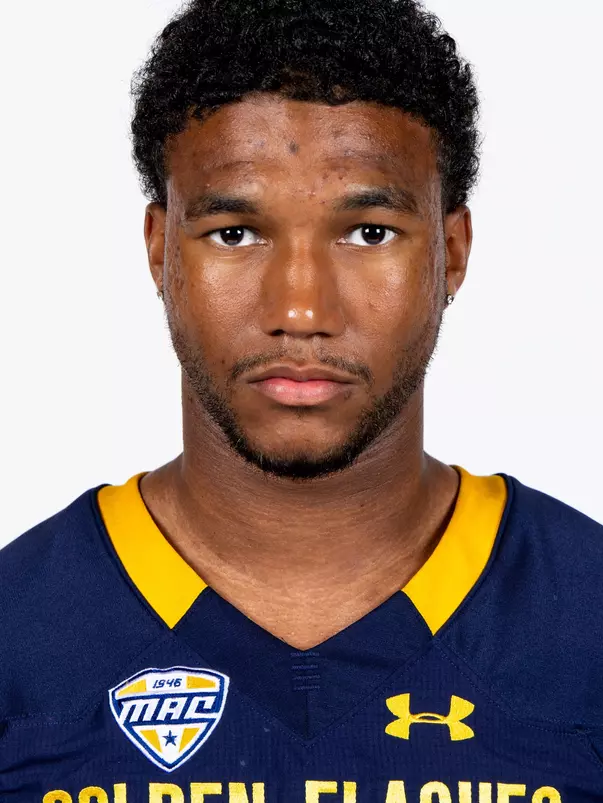 Headshot of a Kent State football player wearing a navy blue jersey with 'Golden Flashes' text in gold letters